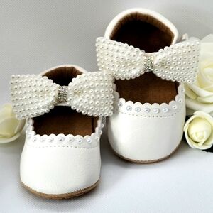 Charming White Baby Shoes with Pearl Bow